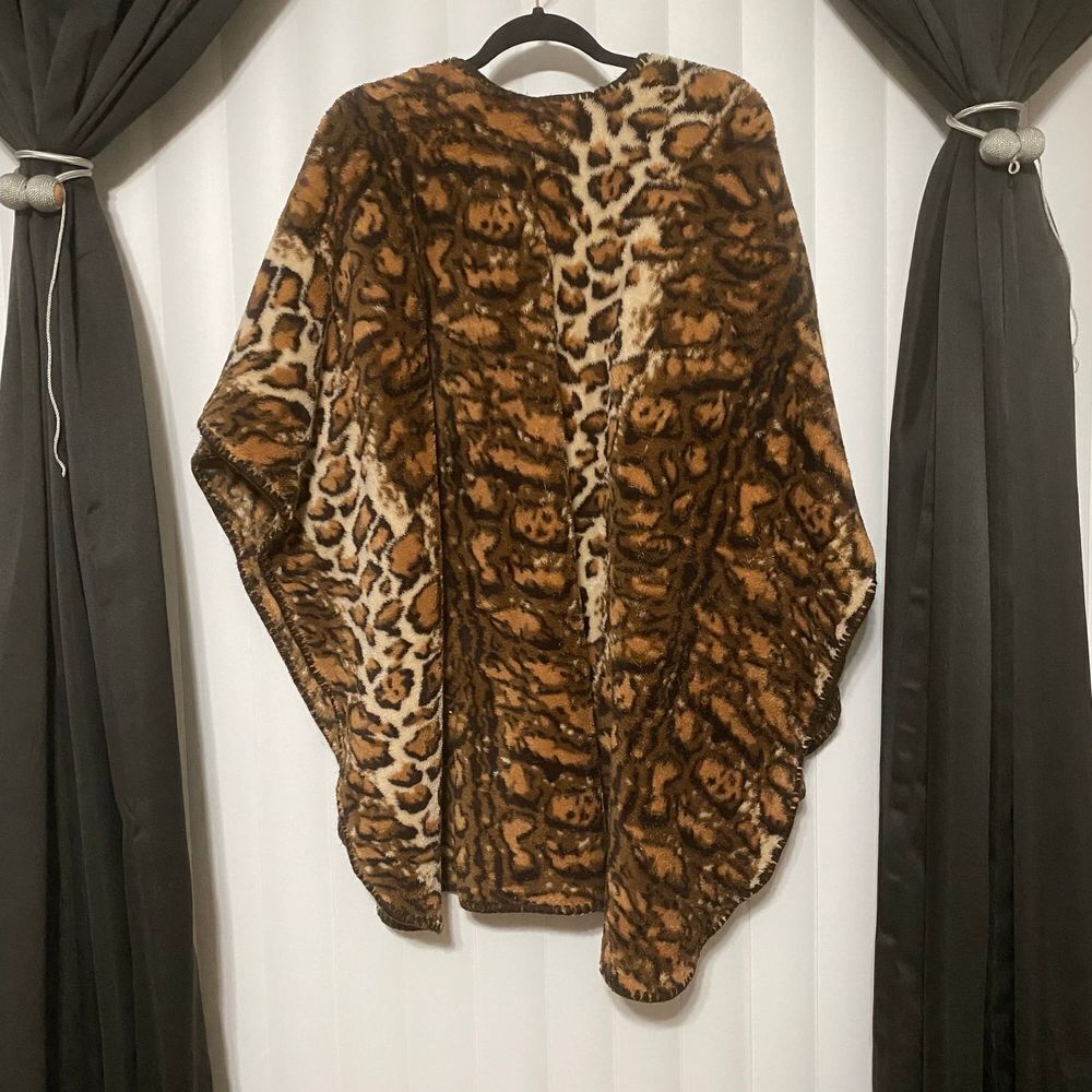 Animal print throw on heavy material- Shaw/Poncho type throw on